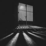 Imagem de grades de presídio feminino